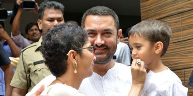 MUMBAI,INDIA JULY 18: Aamir Khan with wife Kiran Rao and son celebrating Eid in Mumbai.(Photo by Milind Shelte/India Today Group/Getty Images)