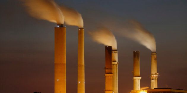 Emissions rise from stacks the Duke Energy Corp. Gibson Station power plant at dusk in Owensville, Indiana, U.S., on Thursday, July 23, 2015. Coal reclaimed its ranking as the top fuel for generating electricity at U.S. power plants in May, beating natural gas, which took the number one spot for the first time in April. Photographer: Luke Sharrett/Bloomberg via Getty Images