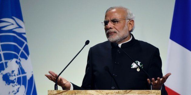 Indian Prime Minister Narendra Modi delivers a speech during the opening day of the World Climate Change Conference 2015 (COP21), on November 30, 2015 at Le Bourget, on the outskirts of the French capital Paris. World leaders opened an historic summit in the French capital with 'the hope of all of humanity' laid on their shoulders as they sought a deal to tame calamitous climate change. AFP PHOTO / ALAIN JOCARD / AFP / ALAIN JOCARD (Photo credit should read ALAIN JOCARD/AFP/Getty Images)