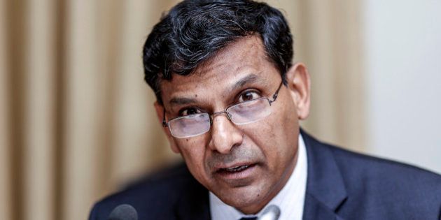 Raghuram Rajan, governor of the Reserve Bank of India (RBI), speaks during a news conference at the central bank's headquarters in Mumbai, India, on Tuesday, Dec. 2, 2014. Rajan left interest rates unchanged for a fifth straight meeting while signaling a possible easing early next year after Prime Minister Narendra Modis government called for lower borrowing costs. Photographer: Dhiraj Singh/Bloomberg via Getty Images