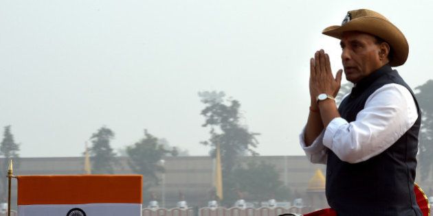 Indian Minister for Home Affairs, Rajnath Singh gestures as he inspects the parade at the start of the Border Security Force (BSF) Golden Jubilee Day celebration in New Delhi on December 1, 2015. AFP PHOTO / Money SHARMA / AFP / MONEY SHARMA (Photo credit should read MONEY SHARMA/AFP/Getty Images)