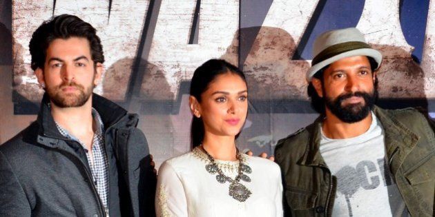 Indian Bollywood actors (L-R) Neil Nitin Mukesh, Aditi Rao Hydari and Farhan Akhtar attend the trailer launch of upcoming Hindi film 'Wazir' in Mumbai on November 18, 2015. AFP PHOTO (Photo credit should read STR/AFP/Getty Images)