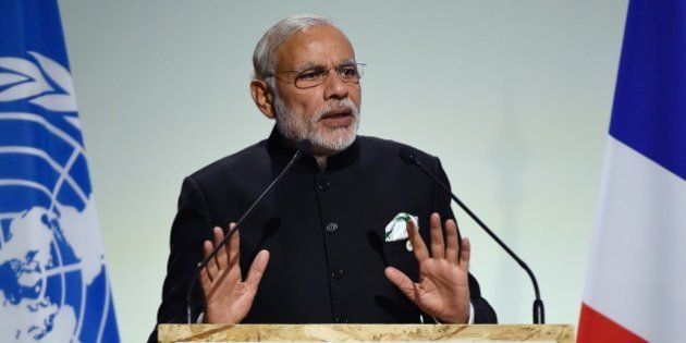 Indian Prime Minister Narendra Modi delivers a speech during the opening day of the World Climate Change Conference 2015 (COP21), on November 30, 2015 at Le Bourget, on the outskirts of the French capital Paris. World leaders opened an historic summit in the French capital with 'the hope of all of humanity' laid on their shoulders as they sought a deal to tame calamitous climate change. AFP PHOTO / ALAIN JOCARD / AFP / ALAIN JOCARD (Photo credit should read ALAIN JOCARD/AFP/Getty Images)