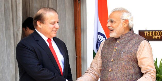 NEW DELHI, INDIA - MAY 27: Indian Prime Minister Narendra Modi (L) shakes hand with his Pakistani counterpart Nawaz Sharif before the start of their bilateral meeting at Hyderabad House on May 27, 2014 in New Delhi, India. New Indian Prime Minister Narendra Modi met with the leaders of rival Pakistan and other neighboring nations a day after being sworn in. (Photo by Ajay Aggarwal/Hindustan Times via Getty Images)