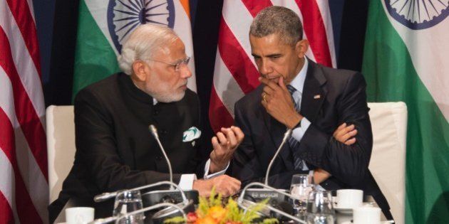 US President Barack Obama (R) talks with Indian Prime Minister Narendra Modi during a meeting at the UN conference on climate change COP21 on November 30, 2015 at Le Bourget, on the outskirts of the French capital Paris. More than 150 world leaders are meeting under heightened security, for the 21st Session of the Conference of the Parties to the United Nations Framework Convention on Climate Change (COP21/CMP11), also known as Ã¬Paris 2015Ã® from November 30 to December 11. AFP PHOTO / JIM WATSON / AFP / JIM WATSON (Photo credit should read JIM WATSON/AFP/Getty Images)