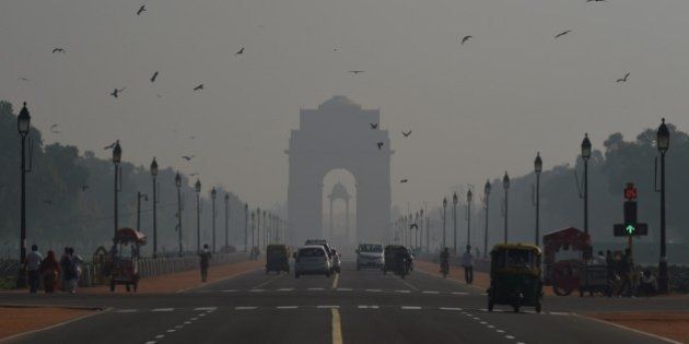 A general view showing smog enveloping New Delhi after the Diwali festival, which is notorious for heralding smoky air as thousands of firecrackers are set off, on November 12, 2015. The Indian capital has been covered in smog in late October and November 2015, blamed on farmers in neighbouring states burning stubble in their fields after the harvest and pollution from firecrackers after the Diwali festival. AFP PHOTO / Money SHARMA (Photo credit should read MONEY SHARMA/AFP/Getty Images)