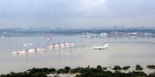 CHENNAI, INDIA - DECEMBER 2 : An aerial view of submerged Chennai airport taken by the Indian Air Force helicopter, following heavy rains in the region on December 02, 2015, in this handout picture provide by Press Information Bureau. (Photo by Press Information Bureau /Anadolu Agency/Getty Images)