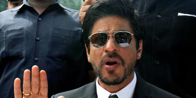 Bollywood star Shah Rukh Khan speaks during a press conference in Srinagar, India, Thursday, Sept. 6, 2012. Khan is in the Indian part of Kashmir, where his mother was from, to shoot his latest film. (AP Photo/Mukhtar Khan)