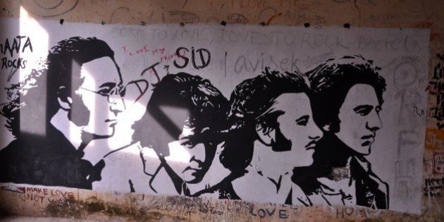 This photograph taken on December 8, 2015 shows graffiti painted on the walls of a hall at the Beatles ashram, as the former ashram of the self-styled guru Maharishi Mahesh Yogi is known, in Rishikesh. An abandoned spiritual retreat in northern India where The Beatles famously learned to meditate has been opened to the public, with plans to turn it into a touristy yoga centre, on December 8, 2015. AFP PHOTO / AFP / STR (Photo credit should read STR/AFP/Getty Images)