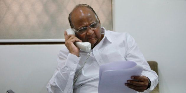 MUMBAI, INDIA - APRIL 1: Nationalist Congress Party (NCP) Chief and Union Agriculture Minister Sharad Pawar gestures while he speaks on an interview at his residence in Breach Candy on April 1, 2014 in Mumbai, India. Commenting on Shiv Sena chief Uddhav Thackerays claim that he stalled the NCPs entry into the BJP-led NDA, Sharad Pawar termed it the joke of the year. (Photo by Kalpak Pathak/Hindustan Times via Getty Images)