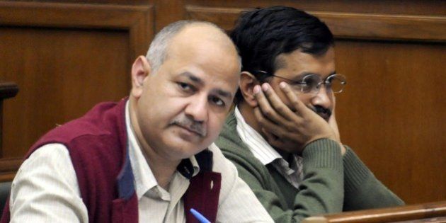 NEW DELHI, INDIA - DECEMBER 1: Chief Minister of Delhi Arvind Kejriwal and Deputy Chief Minister Manish Sisodia attending the Delhi Assembly Winter Session at Delhi Vidhan Sabha on December 1, 2015 in New Delhi, India. Deputy Chief Minister Manish Sisodia presented the Delhi Janlokpal Bill 2015, saying it was an attempt at revamping and strengthening the anti-corruption legislation in the city. Delhi government on Monday tabled a landmark Janlokpal Bill to make the city a Corruption Free Zone. (Photo by Sonu Mehta/Hindustan Times via Getty Images)