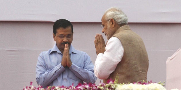 NEW DELHI, INDIA - OCTOBER 31: Prime Minister Narendra Modi with Delhi Chief Minister Arvind Kejriwal during the Run for Unity on Rashtriya Ekta Diwas on 140th birth anniversary of Sardar Vallabhbhai Patel, at Rajpath, on October 31, 2015 in New Delhi, India. The BJP has declared this day as Rashtriya Ekta Diwas (National Unity Day). Modi flagged off the Run for Unity event. (Photo by Virendra Singh Gosain/Hindustan Times via Getty Images)