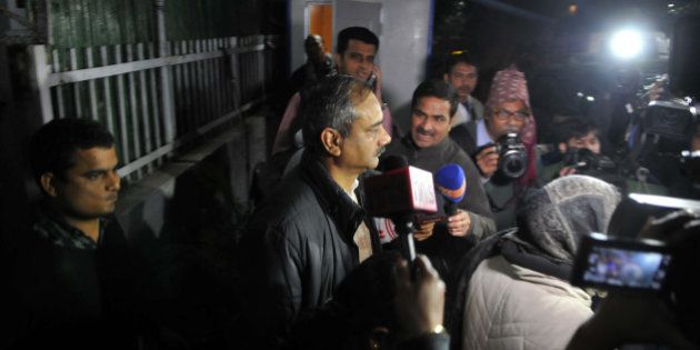 NEW DELHI, INDIA - DECEMBER 15: CBI team taking Rajendra Kumar Gupta for questioning during the raid at his house at New Friends Colony on December 15, 2015 in New Delhi, India. CBI today set off a political storm when it carried out raids in 14 places in a corruption case against Rajendra Kumar, Delhi Chief Minister Arvind Kejriwalâs Principal Secretary and six others. (Photo by Abhinav Saha/Hindustan Times via Getty Images)