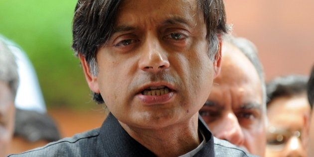 Indian Junior Foreign Minister Shashi Tharoor addresses the media at parliament house in New Delhi on April 16, 2010. Junior Indian Foreign Minister and former high-flying UN official Shashi Tharoor, 54, has been in the eye of a storm since the weekend when news broke that a friend, said by Indian media to be his girlfriend, had been given a free stake in a new IPL franchise. Tharoor has denied the allegations. AFP PHOTO/Prakash SINGH (Photo credit should read PRAKASH SINGH/AFP/Getty Images)