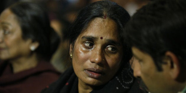 NEW DELHI, INDIA - DECEMBER 16: Mother of Nirbhaya gets emotional at a prayer meeting to remember Nirbhaya on the second anniversary of the fatal gang-rape organized by Nirbhaya Jyoti Trust at Rajendra Bhawan on December 16, 2014 in New Delhi, India. On December 16, 2012, a 23-year-old physiotherapy student was brutally gang raped and by six men, including a juvenile, in a moving bus. The incident unleashed a wave of public anger over levels of violence against women in the country. Nirbhaya Jyoti Trust which was established by Nirbhayas parents (Photo by Raj K Raj/Hindustan Times via Getty Images)