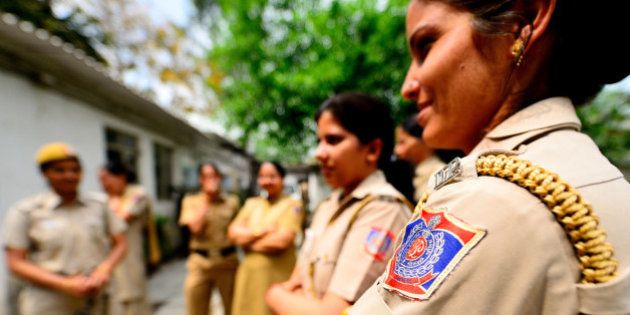 NEW DELHI, INDIA - MARCH 27: Women police on duty at Maurice Nagar, Police Station, near Delhi University, on March 27, 2014 in New Delhi, India. (Photo by Priyanka Parashar/Mint via Getty Images)