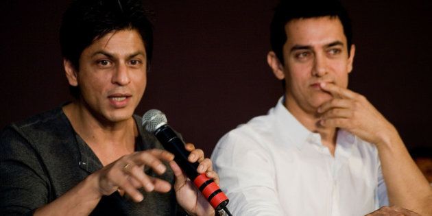 BOMBAY, INDIA - APRIL 07: Bollywood superstars Shah Rukh Khan and Aamir Khan takes part in discussions about how to resolve the current impasse between multiplexes and film producers over sharing equal revenue in Bollywood at J. W. Marriott on April 7, 2009 in Bombay, India (Photo by Ritam Banerjee/Getty Images)