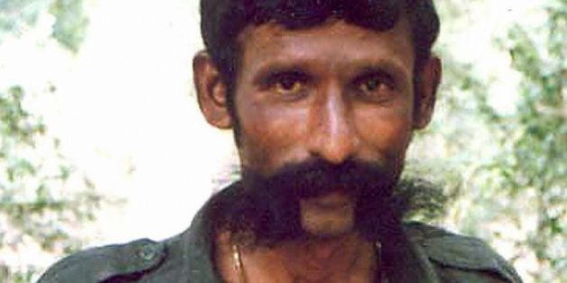 -, INDIA: (FILES) An undated file photo shows India's most wanted man, Koose Muniswamy Veerappan. India's most wanted criminal, Veerappan, who was accused of more than 100 murders, has been shot dead after decades on the run, police said 19 October 2004. The bandit, said to be around 60 years old now, was killed in a forest in southeastern Tamil Nadu state, said Special Task Force chief K. Vijay Kumar. AFP PHOTO (Photo credit should read -/AFP/Getty Images)