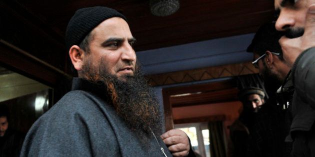 SRINAGAR, INDIA - MARCH 9: Kashmiri separatist leader Masarat Alam at his home on March 9, 2015 in Srinagar, India. Alam is the chairman of Muslim League, a constituent of hard-line Hurriyat Conference led by Syed Ali Shah Geelani. He was arrested during the 2010 unrest in the Kashmir Valley for allegedly inciting youth, was released by the newly-installed PDP-BJP coalition government on Saturday. Masarats release has drawn a lot of criticism from several political parties including the coalition partner BJP. (Photo by Waseem Andrabi/Hindustan Times via Getty Images)