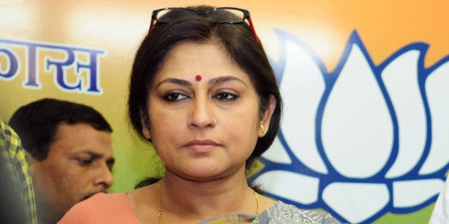 KOLKATA, INDIA APRIL 9: (L- R) Actress Rupa Ganguly with Rahul Sinha, BJP State president (white kurta) during a releases of BJP Manifesto for forth coming Kolkata corporation election, on April 9, 2015 in Kolkata, India. (Photo by Indranil Bhoumik/Mint via Getty Images)