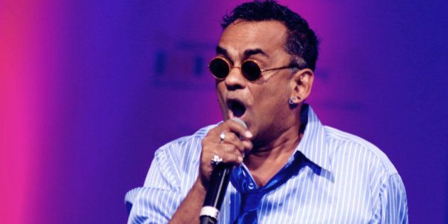 Indian Bollywood musician Remo Fernandes performs during the Tassel Fashion and Lifestyle Awards 2013 in Mumbai late July 8, 2013. AFP PHOTO/STR (Photo credit should read STRDEL/AFP/Getty Images)