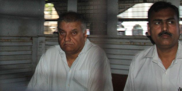 MUMBAI, INDIA - NOVEMBER 30: Peter Mukerjea, accused in Sheena Bora case, was produced at Esplanade court on November 30, 2015 in Mumbai, India. Special court extended the CBI custody of former media tycoon Peter Mukerjea, one of the four prime accused in the Sheena Bora murder case, by one day. (Photo by Bhushan Koyande/Hindustan Times via Getty Images)