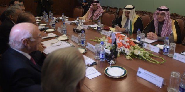 Saudi Minister of Foreign Affairs Adel al-Jubeir (R) listens as Pakistan's National Security Advisor Sartaj Aziz (L) speaks during their meeting at the Foreign Ministry in Islamabad on January 7, 2016. Adel al-Jubeir arrived in Islamabad to meet with Pakistani leaders and military officials. AFP PHOTO / POOL / AAMIR QURESHI / AFP / POOL / AAMIR QURESHI (Photo credit should read AAMIR QURESHI/AFP/Getty Images)