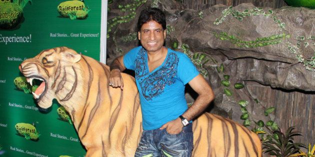 MUMBAI, INDIA - JUNE 17: Raju Srivastava during the launch of the restaurant 'Rainforest Restaurant and Bar' at Andheri in Mumbai on June 17,2011. (Photo by Yogen Shah/India Today Group/Getty Images)