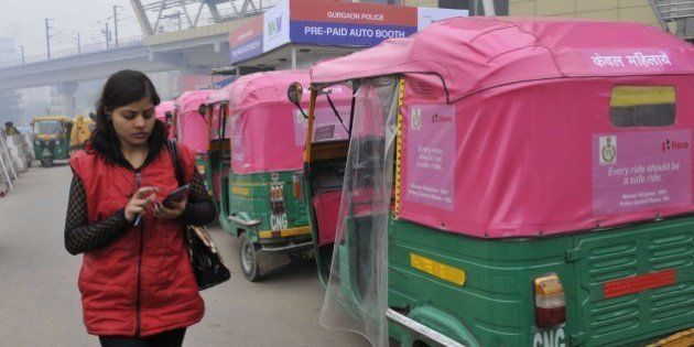 Gurgaon, India - January 1: Pink autos for women commuters which are yet to be launched but are ferrying passengers in the city, on January 1, 2015 in Gurgaon, India. Pink Auto service for women commuters was launched by Odisha Chief Minister Naveen Patnaik. (Photo by Sunil Saxena/Hindustan Times via Getty Images)