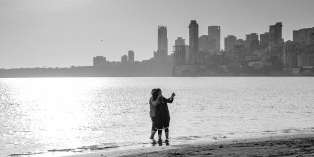 Couple taking selfie at Chowpatty beach, Mumbai.