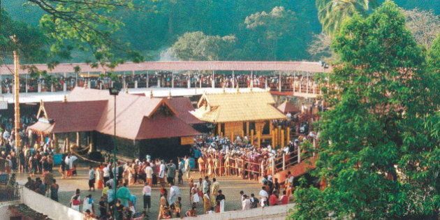 INDIA - JULY 03: Devotees thronging the temple, Lord Ayyappa of Sabarimala in Kerala, India (Photo by Shankar/The India Today Group/Getty Images)