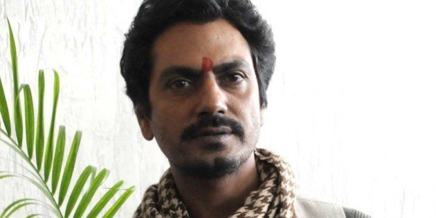 INDORE, INDIA - AUGUST 4: Bollywood actor Nawazuddin Siddiqui during the promotion of the upcoming movie 'Manjhi -The Mountain Man' on August 4, 2015 in Indore, India. The film directed Ketan Mehta and produced by Viacom 18 Motion Pictures, Maya Movies Pvt. Ltd. & NFDC. The film star cast Nawazuddin Siddiqui and Radhika Apte in the lead roles. The movie is based on the life of Dashrath Manjhi (Nawazuddin Siddiqui), who lived in Gehlaur village, near Gaya, in Bihar, carved a road through a mountain in 22 years. The film is scheduled for release on August 21, 2015 in theaters. (Photo by Shankar Mourya/Hindustan Times via Getty Images)