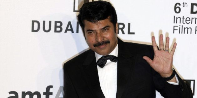 Indian actor Mammootty arrives to attend the Auction for Cinema Against Aids on the sidelines of the DIFF in the Gulf emirate on December 10, 2009. Despite an alarming debt crisis, Dubai is rolling out the red carpet with its usual splendour for movie stars as the Gulf state's sixth annual film festival kicked off on December 9. AFP PHOTO/STR (Photo credit should read -/AFP/Getty Images)