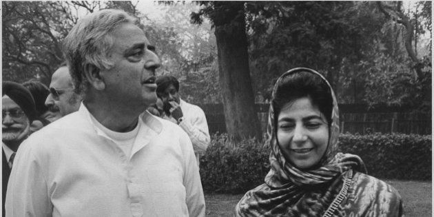 NEW DELHI, INDIA - DECEMBER 25: (Editor's Note: This image is from Hindustan Times Archives) Former Home Minister Mufti Mohammad Sayeed with his daughter Mehbooba Mufti at a Press Conference on December 25, 1996 in New Delhi, India. Chief Minister of Jammu and Kashmir Mufti Mohammad Sayeed died at All India Institute of Medical Sciences (AIIMS) on morning of January 7, 2016. The 79-year-old leader who founded the Jammu and Kashmir Peoples Democratic Party (PDP) had been admitted to the premier hospital in Delhi with complaints of severe fever and neck pain. (Photo by Santosh Gupta/Hindustan Times via Getty Images)