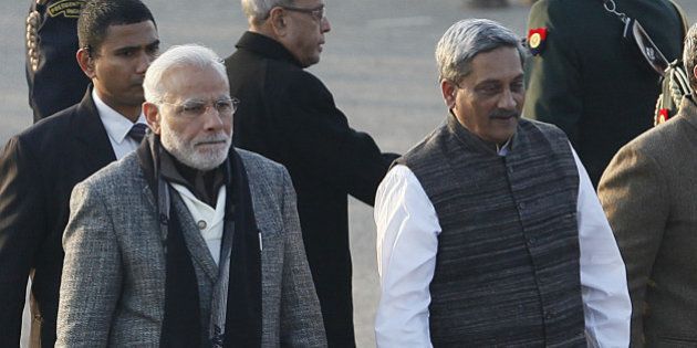 NEW DELHI, INDIA - JANUARY 29: Prime Minister Narendra Modi along with Defence Minister Manohar Parrikar, Minister of State for Defence Rao Inderjit Singh arrive for the Beating Retreat Ceremony at Vijay Chowk on January 29, 2015 in New Delhi, India. The ceremony is a culmination of Republic Day celebrations and dates back to the days when troops disengaged themselves from battle during sunset. (Photo by Raj K Raj/Hindustan Times via Getty Images)