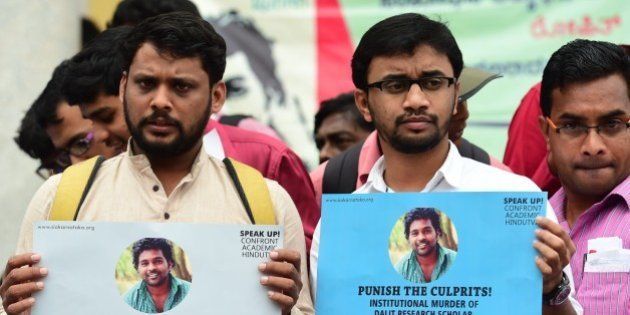 Members of the Students Christian Movement of India and other activists stage a protest in Bangalore following the suicide of Rohit Vemula, a doctarate student at the Hyderabad Central University, on January 19, 2016. Rohit, a second-year PhD student of Life Sciences was found hanging in his hostel room after he was suspended from the college due to a political dispute. AFP PHOTO/Manjunath KIRAN / AFP / MANJUNATH KIRAN (Photo credit should read MANJUNATH KIRAN/AFP/Getty Images)