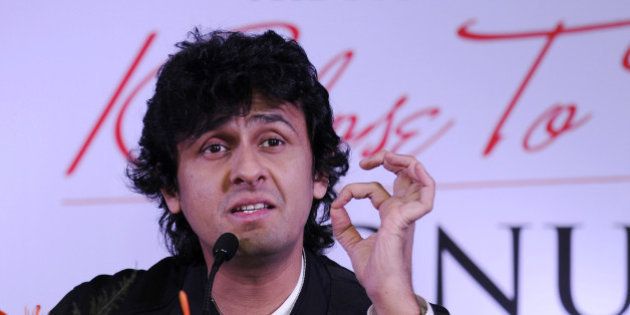 NOIDA, INDIA - NOVEMBER 11: Indian Bollywood playback singer Sonu Nigam speaks during a press conference on November 11, 2014 in Noida, India. Nigam will perform live with 30 musicians at Entertainment city, Noida on November 22. The Show Klose to my Heart will be happening for the first time in Delhi NCR. (Photo by Burhaan Kinu/Hindustan Times via Getty Images)
