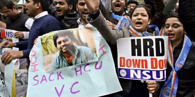 NEW DELHI, INDIA - JANUARY 19: NSUI students shout slogans against Union Minister Bandaru Dattatreya during a protest against the suicide of Research scholar Rohit Vemula in front of HRD Minister Office at Shastri Bhawan on January 19, 2016 in New Delhi, India. 26-year-old Vemula, a second-year research scholar of science, technology and society studies department at Hyderabad University, was found hanging in his friendâs hostel room on Sunday night. He, along with four Dalit research scholars, was expelled from the University of Hyderabad 12 days ago over alleged fight with another student group. (Photo by Arun Sharma/Hindustan Times via Getty Images)