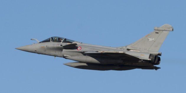 A French Air Force Dassault Rafale fighter aircraft flies during the inaugural Trilateral Exercise between the US Air Force, United Kingdom's Royal Air Force and the French Air Force at Joint Base Langley-Eustis in Hampton, Virginia, December 15, 2015. AFP PHOTO / SAUL LOEB / AFP / SAUL LOEB (Photo credit should read SAUL LOEB/AFP/Getty Images)