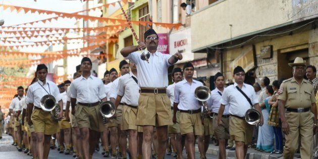 The band of Rashtriya Swayamsevak Sangh (RSS) take part in the 'Shrung Ghosh Path Sanchalan' (Route March by Brass Band) by RSS cadets in Bangalore on January 9, 2016. The march was part of Rashtriya Swayamsevak Sangh's Akhil Bharatiya Shrung Ghosh (Brass Band) four-day Shibir 'Swaranjalj.' AFP PHOTO/ Manjunath KIRAN / AFP / Manjunath Kiran (Photo credit should read MANJUNATH KIRAN/AFP/Getty Images)