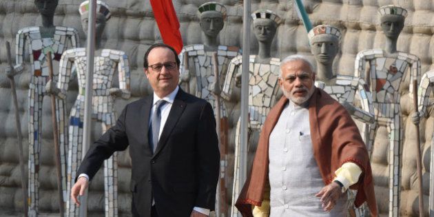 CHANDIGARH, INDIA - JANUARY 24: French President Francois Hollande and Prime Minister Narendra Modi at Rock Garden on January 24, 2016 in Chandigarh, India. Hollande was joined by PM Modi in Chandigarh later in the afternoon at the Rock Garden, a famous landmark of the city. The two will attend a CEO's Forum and the India-France Business Summit. Hollande is the chief guest at the Republic Day Parade this year. India and France are in negotiations for 36 Rafale fighter jets in fly away conditions since the announcement for the deal was made by Prime Minister Narendra Modi in April during his visit to France. (Photo by Sanjeev Sharma/Hindustan Times via Getty Images)