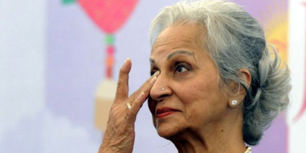 JAIPUR, INDIA - JANUARY 22: Veteran bollywood actress Waheeda Rehman got emotional as she remembered actor Dev Anand during session on Mujhe Jeene Do at the Jaipur Literature festival at Diggi Palace on January 22, 2015 in Jaipur, India. One of the largest literary festivals on earth, the Jaipur Literature Festival brings together some of the greatest thinkers and writers from across South Asia and the world. (Photo by Mohd Zakir/Hindustan Times via Getty Images)