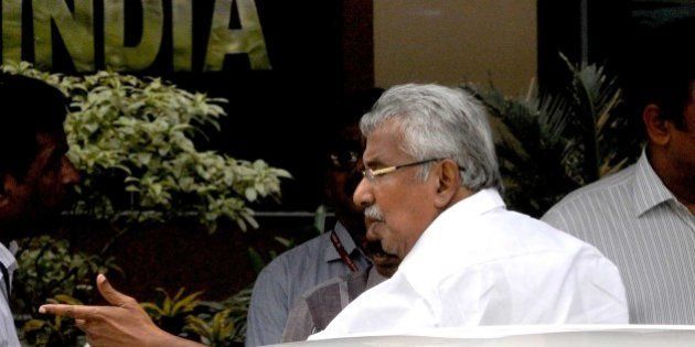 NEW DELHI, INDIA - JUNE 27: Kerala Chief Minister Oommen Chandy arrives for participating in the 4th meeting of CM`s sub group of Niti Aayog at Niti Aayog on June 27, 2015 in New Delhi, India. The sub-group was constituted by the Prime Minister in March this year in pursuance of decision taken in the first meeting of governing council of NITI Ayog a month earlier. (Photo By Sonu Mehta/Hindustan Times via Getty Images)