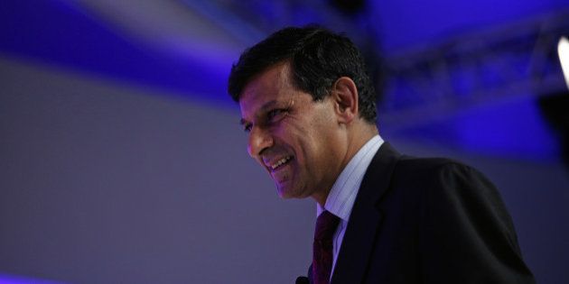 Raghuram Rajan, governor of the Reserve Bank of India (RBI), arrives for a panel session at the World Economic Forum (WEF) in Davos, Switzerland, on Wednesday, Jan. 20, 2016. World leaders, influential executives, bankers and policy makers attend the 46th annual meeting of the World Economic Forum in Davos from Jan. 20 - 23. Photographer: Matthew Lloyd/Bloomberg via Getty Images