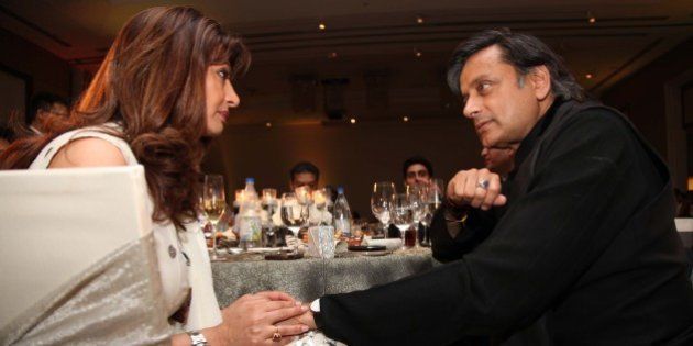 GURGAON, INDIA - MARCH 21: Indian politician Shashi Tharoor with his wife Sunanda Pushkar Tharoor during the âDelhiâs Most Stylish Peopleâs Choice Awards 2013â held at The Oberoi Business Hotel on March 21, 2013 in Gurgaon, India. Delhiâs Most Stylishâ, the iconic awards that celebrate style and the stylish, bringing together people across politics, fashion, films and more. Delhiâs most stylish people chosen by the jury were rewarded in a glitzy ceremony. The jury this time comprised Sanjoy Narayan, Editor-in-Chief, Hindustan Times, actor Chitrangda Singh, industrialist Peter Punj, Sunil Sethi, president, FDCI and Sonal Kalra, Editor, HT City. (Photo by Manoj Verma/Hindustan Times via Getty Images)