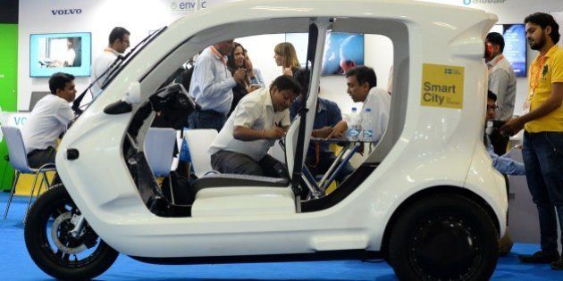 A Swedish Newly Zbee electric car is displayed at the Smartcity Expo in the Indian capital New Delhi on May 20, 2015. The Zbee is an energy-efficient electric vehicle designed to carry goods or a small number of passengers short distances. AFP PHOTO / SAJJAD HUSSAIN (Photo credit should read SAJJAD HUSSAIN/AFP/Getty Images)