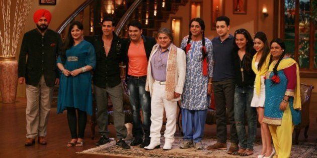 MUMBAI, INDIA AUGUST 01 - Akshay Kumar, Imran Khan and Sonakshi Sinha with Kapil Sharma, Sumona Chakravarti, Ali Asghar, Sunil Grover, Upasna Singh, Naseem Vicky, Navjot Singh Siddhu and Soni Singh on the sets of Comedy Nights with Kapil for the promotion of Once Upon a Time in Mumbaai 2 on 1st August, 2013 in Mumbai.(Photo by Milind Shelte/India Today Group/Getty Images)
