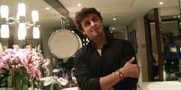 NEW DELHI, INDIA - AUGUST 17: Bollywood playback singer Sonu Nigam during an interview at Hotel Taj Palace on August 17, 2014 in New Delhi, India. (Photo by Sanjeev Verma/Hindustan Times via Getty Images)