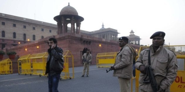 NEW DELHI, INDIA - JANUARY 3: Delhi Police and CRPF security personnel alert at Raisina Hill after authorities received a bomb threat after the fresh firing and bomb explosion inside the Pathankot Air Base, on January 3, 2016 in New Delhi, India. Security across the capital was beefed up after the fresh firing and bomb explosion inside the Pathankot Air Base. The deadly assault on an Indian air base near the Pakistan border was 'a heinous' terrorist attack, the United States said, urging the two rivals to work together to hunt down those responsible. Three security officers were killed in the attack by suspected Islamist militants on Pathankot base in northern Punjab state early January 2. So far, six terrorists and seven soldiers, including a Lieutenant colonel, have been killed in the exchange of fire. Five members of the Defence Security Corps succumbed to injuries in the hospital. The attackers were believed to have infiltrated from Pakistan and there was speculation that they may belong to Jaish-e-Mohammad headed by Maulana Masood Azhar of the Kandahar hijack episode. (Photo by Sonu Mehta/Hindustan Times via Getty Images)