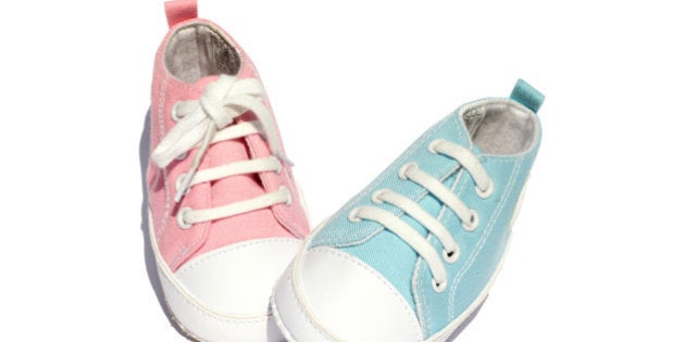 pink and blue baby shoes